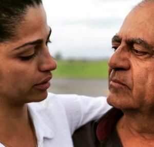 Camila Alves Instagram - My father…
Man of the land…
Where I learned my connection to the dirt, what grows, what gives , what don’t . 
A farm man, a ranch man .
Only what’s needed.
Honoring the balance
A simple miner , for complicated gemstones 
Man of Morals
From who I learned to not be impressed by a “thing”, instead by substance.

True story here… I once got proposed by a Prince, a man of fortune beyond lands, a man, who if I accepted his proposal to marry, would’ve changed the status of my whole family for generations to come. Feeling the weight of not being a decision just for me, I sat down to talk to my dad, he quietly listened, and his first question was…
Do you love him? 
I answered, “I am not sure, but I do like him a lot and I think the love could grow.”
Feeling the weight on my voice he quickly asked,
“Can you see yourself having a child with him?”
I quickly said, “No.”
“Then you have your answer,” he said.
He then went on to quote once again something he had said to me earlier in my life that really shook me. 
“If you marry a man for only the material things he has then you are a high class prostitute to me.”

I know it sounds harsh but I thought about it throughout my life when and where I met many man that had a lot of material wealth and access but lacked true soul and morals. 

When my dad the Farmer met Matthew, he had no idea who Matthew was. We have some funny stories, but Matthew is best to tell… 😂 

My dad always reminds me and gives me the permission to:

“Do what’s right for you…You now have your own family to build, do not carry any of the weight of your mother and I, our mistakes or accomplishments. You start fresh…Do not take the focus away from yours. “ 

Simple heart
That’s where I get mine from 
Thank you dad ….. it was all the learnings that got me to Matthew the best father for our 3 kids honestly one of the best fathers I have ever meet! It is beautiful and a blessing to see! Beyond grateful 🙏🏽 

Happy Father’s Day.