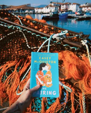 Casey McQuiston Instagram - part one of a book 5 research trip/visit to some of my favorite destinations in THE PAIRING: saint-jean-de-luz and san sebastián. i got a sunburn on my knees! i went on a boat! i saw a castle! i successfully completed many transactions in french! basque country is so warm and delicious and salty and goooorgeous, and i swear i saw kit & theo at every beach and every pintxo bar.