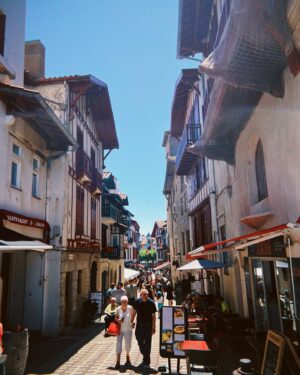 Casey McQuiston Instagram - from THE PAIRING travel files: saint-jean-de-luz

gonna start dumping photos from the trips i took while researching/writing/editing/getting ready to release this book! as a reader i always love a visual reference, and a writer i can’t write without them. here are some of mine!

things i loved about saint-jean-de-luz: the market, the soft sands, the red timber on the houses, gateau basque, fresh squid, the little port full of fishing boats 

things theo & kit love about saint-jean-de-luz: friendly fishmongers, rock formations, secret coves and hidden beaches, the views of the pyrenees, ocean-aged wine. swipe to the end for a peek at a moment between them on this tour stop 😘