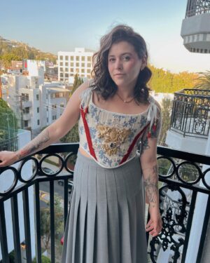 Casey McQuiston Instagram - tonight i received a tremendous honor: @taylorzakharperez told me i looked jacked 

just as importantly, i was reunited with my RWRB fam for an actual emmy fyc event for the movie based on my book!!! we never got to have our big red carpet premier last year, but baby we’re making up for it now! i cannot, even now, believe this is my life. wow. wowowowowowowwww!!!

styling: @dottttbass 
corset: @lucciaredesigns 
makeup: @itsnicklennon 
hair: @dwayne3ross
