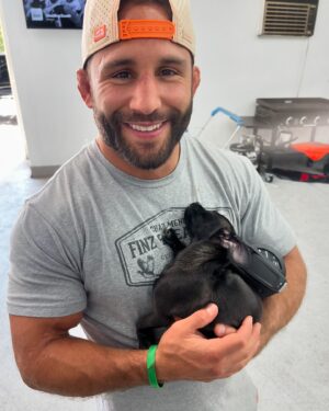 Chad Mendes Instagram - Stopped by to see my boy @hottshotsdetailing new pup and she immediately passed out in my arms lol. Might be time for the Mendes family to get a new pup!