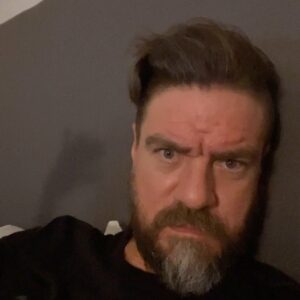 Charles Halford Instagram - Hotel fever.. “like” cabin fever, but in a hotel room.  Nice room.  But arm dogs are vicious in here.
The good news is…  Hmm…  Can’t tell you…. Yet…
But hey!  Here’s to free haircuts and new adventures! 
#ShadowPuppy #DangerHaircut #rrrarrr