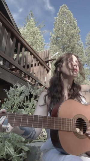 Chelsea Wolfe Instagram - playing a bit of my cover of “Oui Oui Marie” from “X” to celebrate the release of “Maxxxine” 🌻 watch the longer version on my YouTube channel

@a24 #tiwest @tylerbatesofficial 

last summer in the garden 🌞