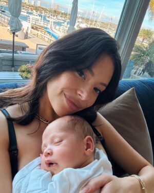 Chloe Bridges Instagram - Six months postpartum today 🤯🥹 Beau and I have giggled, cried, cuddled, had most of our hair fall out (y’all didn’t warn me about that one), grown, become better nappers, and learned a whole lot. He’s 2.5 weeks in the first slide and 5.5 months in the last… what do they say? The days are long but the years are short? I’m currently typing this as he is latched on my boob and I am still in last night’s pajamas (it’s 5:47 pm) so yeah that checks out lol