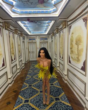 Chloe Khan Instagram - @FashionNova for the Main Character Girlies 🦚 

🔎 Renee Sequin Feather Mini Dress - Chartreuse