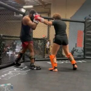 Chris Curtis Instagram - Yesterday, we worked on close range kicking techniques and how to land leg kicks inside of combinations so that we don't have to take ourselves out of range once we get into our preferred distance. @majo.favelamma working on chopping the leg while being able to go quickly go back to hand combinations in the video above.