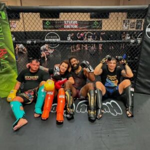Chris Curtis Instagram - Yesterday, we worked on close range kicking techniques and how to land leg kicks inside of combinations so that we don't have to take ourselves out of range once we get into our preferred distance. @majo.favelamma working on chopping the leg while being able to go quickly go back to hand combinations in the video above.