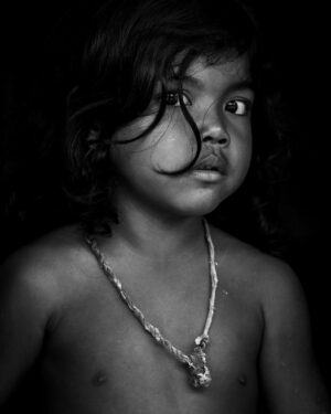 Chris Packham Instagram - Orang Rimba Boy , Sumatra . Canon 5D SR , 70-200mm F4 , 1.4X . With their forest home gone some of the tribe have moved into permanent homes . The loss of their nomadic lifestyle and the lack of need to hunt and forage for food has had significant effects socially and psychologically . I spent a sweaty hour in this settlement and the expressions of my subjects tell the story with a desperate poignancy . See more this Sunday at 9pm on BBC2 ‘Chris Packham - In Search of the Lost Girl’ . #canon #canonphotography #canonuk #sumatra #orangrimba #potrait #palmoil #palmoilfree #photography #photooftheday