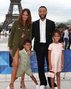 Chrissy Teigen Instagram - opening ceremonies! sure it was a little (a lot) rainy but wowowowowow absolutely epic experience (and got to see a few of my favorite people!)