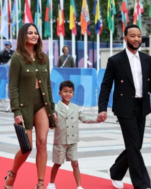 Chrissy Teigen Instagram - opening ceremonies! sure it was a little (a lot) rainy but wowowowowow absolutely epic experience (and got to see a few of my favorite people!)