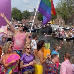 Courtney Act Instagram - What a glorious pride you have, Amsterdam! Thank you for a magical day and thank you to @missenvyperu and @rtl.nl for having me. 

The parade happens on the canal, the pride floats literally float down the water as hundreds of thousands of people cheer from the shore. There are about 26 bridges along the route which, as you will see in these videos, every few minutes everyone has to duck to avoid decapitation, the inflatables have come down, and then we emerge out the side to new crowd of people. Such a fun and unique pride parade! 

Looking forward to performing and hosting The Dam Stage today for the Closing Party! #amsterdampride