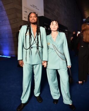 Danzal Baker Instagram - NGV Gala 2023 🩵

suits @wynnhamlyn 
jewellery @sarahgardnerjewellery 
harnesses @publishedby 
shoes @maisonmargiela 
brooches are vintage
styled by yours truly 💁🏻‍♀️

Danzal’s hair by @helenmasoeartistry