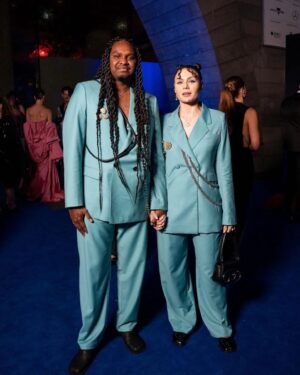 Danzal Baker Instagram - NGV Gala 2023 🩵

suits @wynnhamlyn 
jewellery @sarahgardnerjewellery 
harnesses @publishedby 
shoes @maisonmargiela 
brooches are vintage
styled by yours truly 💁🏻‍♀️

Danzal’s hair by @helenmasoeartistry