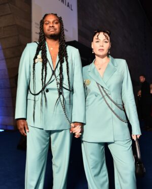 Danzal Baker Instagram - NGV Gala 2023 🩵

suits @wynnhamlyn 
jewellery @sarahgardnerjewellery 
harnesses @publishedby 
shoes @maisonmargiela 
brooches are vintage
styled by yours truly 💁🏻‍♀️

Danzal’s hair by @helenmasoeartistry