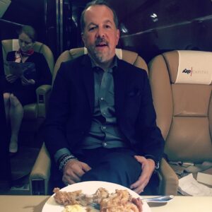 David Costabile Instagram - The making of Chickentown. Damian proudly pointing to the Axe Cap jet is rudely upstaged by director @neil.burger. Myself and  @kellyaucoin77 stuffing ourselves with fried bird and bourbon in this case @michterswhiskey 20 yr old bourbon. The only way to fly. Don’t miss this episode. #bts @sho_billions #wags #teamwags #wagsismyspiritanimal