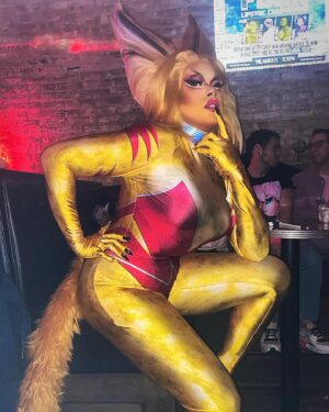 Dax ExclamationPoint Instagram - I am a cat. I’m only dressed in disguise. I’ll hypnotize you when you look in my eyes. I am a cat so if you hurt me I’ll bite. 

@homosuperiorpodcast @theuncannyexp @geeksout @awesomecons @tradebardc #feral #xFactor #mutantAndProud #catStuff #catNonsense 

(hair and wig supplies provided by @ardawigs 

#facebassfoundation from @indibeat_cosmetics

Suit pattern by @cyanmandesigns ) 😻😸😺😾
