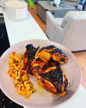 Declan Horgan Instagram - Chef Declan Horgan’s easy Keto Tandoori Chicken.
1. 2 pounds of Chicken thighs Skin on bone in.(what ever way you want them to be will just shorten cooking time and also may lead to drying out of skinless 
2. 4 tablespoons of Greek Yogurt 
3. 1 teaspoon pink salt or kosher salt 
4. 2 tablespoons minced garlic 
5. 1 teaspoon garlic powder 
6. 1 teaspoon of onion powder 
7. 2 tablespoon minced fresh garlic or purée (unsweetened) 
8. 1 teaspoon ground ginger 
9. 1 tablespoon paprika(sweet is great smoked is best)
10. 1 teaspoon ground tumeric powder
11. 1 tablespoon Garam Masala 
12. 1/2 teaspoon Cayene pepper 
13. Olive oil 3 tablespoons or Ghee
14. Lime juice and zest of two limes

Method:
Mix ingredients , score chicken and rub marinade into chicken really get it in there, then place in a zip lock bag or bowl and allow to marinade for min. 8hrs , 24 hours is best. When ready preheat over to 400f . Place thighs on a rack on a sheet pan and with a brush evenly baste the thighs with the marinade and remove any clumps of marinade. Cook for 35-40mins or until the meat had a dark finish and the Centre temps are over 165f.

I serve this with a cooling zesty cucumber drizzle. Easy peasy recipe just blend a cucumber peeled and around 10 mint leaves , lime juice, lime zest from your original two and a cup and a half of Greek yogurt till smooth season to taste.