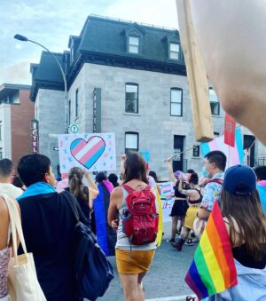 Dominique Provost-Chalkley Instagram - 🏳️‍⚧️ 💚🤍💜🖤💜🤍💛 🏳️‍⚧️

These photos were taken at the Montreal Pride Trans March 2022.
It felt so good to be surrounded by a community rooted in love and authenticity. It also felt deeply important to stand up for all the injustice that trans and non-binary people continue to endure. 

Protect Trans Kids
Protect Trans Love 
We will not be erased. 

Trans and Non-Binary people belong 🏳️‍⚧️🦋#transdayofvisibility