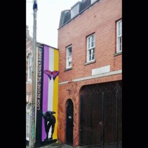 Dominique Provost-Chalkley Instagram - LOOK BEYOND THE GENDER BINARY 🖤💜🤍💛

Hillgrove street, Bristol. 

Thank you @zamzam__zz and @object000 and @peoplesrepublicofstokescroft for your stellar work on this piece. 🙏

My hope is that many non-binary folx feel seen and celebrated through each stroke of colour painted proudly on this wall. 

And to @falsepeak_ for taking the original photo of me! What a fun day of creativity we had running around the streets of Calgary :) 📸🖤

Here’s to non-binary thinking, to moving up and out of our heteronormative conditioning and to a world of freedom and exploration. 

Cheers Queers! 

Dom (they/them) 🦋

#PRSC #StarttheWave #STWcreativity #STWactivism #STWPride 🖤💜🤍💛