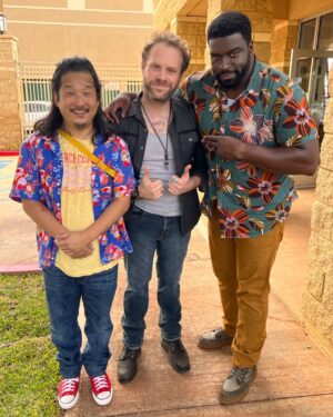 Dylan Saunders Instagram - I went looking for garlic shrimp in Hawaii, and now the season premiere of "Magnum P.I." is here. This special two-hour @magnumpi adventure airs tomorrow, Sunday February 19th at 9pm in its new home on @nbc! I'll see you for episode two with a leather necklace that can only mean things get saucy. Thanks for making me laugh @bobbyleelive, @stephenhillacts, and @mrgenehong.
