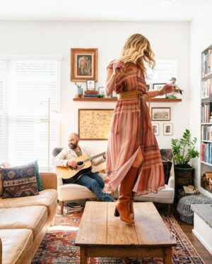 Ellie Holcomb Instagram - Home is everything to Drew and Ellie Holcomb. It’s a place to put their feet up, hang out with family and friends, and get some much needed R&R in between tour dates. 

Their Nashville space also doubles as an archive of memories, in the form of old tour posters, art they collected while abroad, and souvenirs from family trips.

“My dad had this thing when we would travel where he would give us a budget for trinkets,” says Drew. “He would always encourage us to buy something ‘real.’ So when I was eight years old, I bought a real tomahawk in Mesa Verde. I still have it!”

Head to Billy Reid to read more about being At Home with the Holcombs.