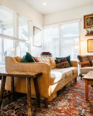 Ellie Holcomb Instagram - Home is everything to Drew and Ellie Holcomb. It’s a place to put their feet up, hang out with family and friends, and get some much needed R&R in between tour dates. 

Their Nashville space also doubles as an archive of memories, in the form of old tour posters, art they collected while abroad, and souvenirs from family trips.

“My dad had this thing when we would travel where he would give us a budget for trinkets,” says Drew. “He would always encourage us to buy something ‘real.’ So when I was eight years old, I bought a real tomahawk in Mesa Verde. I still have it!”

Head to Billy Reid to read more about being At Home with the Holcombs.