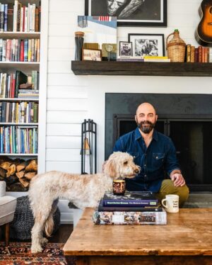 Ellie Holcomb Instagram - Home is everything to Drew and Ellie Holcomb. It’s a place to put their feet up, hang out with family and friends, and get some much needed R&R in between tour dates. 

Their Nashville space also doubles as an archive of memories, in the form of old tour posters, art they collected while abroad, and souvenirs from family trips.

“My dad had this thing when we would travel where he would give us a budget for trinkets,” says Drew. “He would always encourage us to buy something ‘real.’ So when I was eight years old, I bought a real tomahawk in Mesa Verde. I still have it!”

Head to Billy Reid to read more about being At Home with the Holcombs.