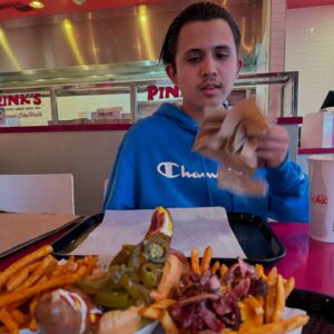 Emilio Rivera Instagram - Boys Day out at Universal . Had to finish it off with some @pinkshotdogs #Rockorivera Thats My Boy #emiliorivera #elpadrino #familiafirst #pinkshotdogs