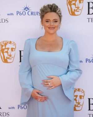 Emily Atack Instagram - I think I deserve a bafta for most club sandwiches consumed before 4pm? 
Huge privilege as always to attend @bafta - 

I had a particular idea in mind for what I wanted for my dress, and the very clever  @franksldn made it for me in such a short space of time. I’ll treasure it always as the last dress I wore whilst pregnant to a red carpet event. 

Well done to nominees and winners, and I hope Lorraine Kelly gets leathered tonight @lorraine ❤️

#baftatvawards with @pandocruises @gettyentertainment