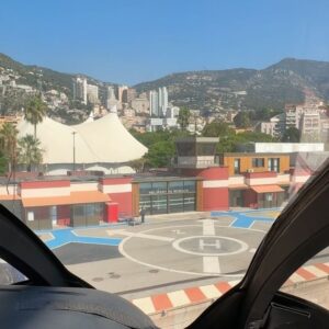 Emily Canham Instagram - well that’s one way around the car sickness 🚁🇲🇨
