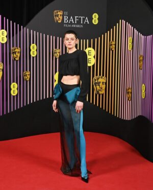 Emma Corrin Instagram - Honoured to present the award for best costume last night at @bafta. Huge congratulations to Holly and to all the nominees 

Thank you so much to the incredible team at @miumiu and to @harry_lambert for dreaming up this insanely gorgeous outfit. Thanks to @cartier for decking me out in the most amazing pieces. And @danielmartin81 and @ginakanemakeup for the glam and the love and the pep talks ❤️