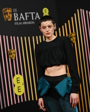 Emma Corrin Instagram - Honoured to present the award for best costume last night at @bafta. Huge congratulations to Holly and to all the nominees 

Thank you so much to the incredible team at @miumiu and to @harry_lambert for dreaming up this insanely gorgeous outfit. Thanks to @cartier for decking me out in the most amazing pieces. And @danielmartin81 and @ginakanemakeup for the glam and the love and the pep talks ❤️