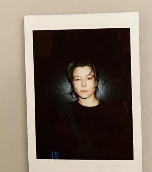 Emma D'Arcy Instagram - @jw_anderson Milan aw24
🦋
curtains! by @jodytaylorhair 
all blues! by @rosefordestudio 
those cheekbones! by @phoebewalters 
with @dobbscld   @tmayb 
 🦋
 🦋