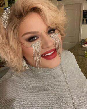 Eureka O'Hara Instagram - “Cheers to a Non-Alcohol and authentic New Year surrounded by the love of family and chosen family. Here’s to the beautiful journey ahead, embracing our true selves, and creating new memories. I’m so thankful for the hard year I’ve had, but even more thankful for the new friends and #fambam that have seen me through unconditionally.  I’m so excited for the new year and New Face, Thank you @drpatrickkdavis 
.
#🐘👑 
#💜🏳️‍⚧️
Dress and Jewelry Style @theplusbusboutique 
Cosmetics @esthers_styles . #recovery #mentaljourney #ChosenFamilyLove #NewYearNewJourneys