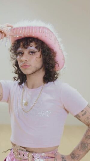 Felix Mufti Instagram - In episode five we speak to actor, writer, and performer Felix Mufti. Fresh off of his @netflixuk debut in season 4 of @sexeducation , Felix spills on the perfect behind-the-scenes outfit. He talks about how to wear what you want regardless of other people’s opinions and the freedom that gives. And we hear how a pair of boots inspired the creation of a pink sparkly cowboy.

#WhatArtistsWear #SexEducation #Liverpool #Fashion