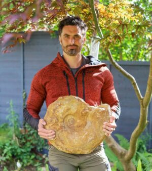 Fiann Smithwick Instagram - Ad| This is one of the largest ammonites I found during last winter's fossil hunting. I've left it "as found" as it was pretty well prepped by falling from the cliff! I'm not sure how it survived a 100 foot fall and stayed intact, but I'm glad it did! 
🗿🌊🐚🗿
I'm also rocking my new @revolutionrace gear! They've have been helping out my  fossil hunting by providing great outdoor gear. For the next two days, I've got a discount code for any of my followers to get 20% off any Revolution Race gear. Use the code FOSSILS20 at checkout to take advantage! 
💦💨🧥👖
I love their gear for my fossil hunting and would highly recommend it. The code is valid for people living in the UK and Ireland from the 9th to the 11th June and can't be used in combination with any other discounts. Enjoy!
#fossil #fossils #art #geology #palaeontology #paleontology #paleo #curiosity #ancient #history #collect #collection #animal #animals #evolution #science #museum #jewel #collecting #treasure #outdoor #outdoors #jurassiccoast #hiking #explore #exploration #adventure #adventuring #walking #ammonite