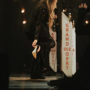 Gabby Barrett Instagram - What an unforgettable night! So incredibly happy and grateful that I got to play the Grand Ole Opry. 🤍 
I was supposed to make my debut in 2020, but then Covid happened and pregnancies, etc. so a piece of my heart is officially filled ✨

our tour starts this week in Kansas, go grab your tickets at the link in my bio to come see us on the road this year 🤎

Stylist: @tiffanygiffordstyle 
Suit: @cinqasept @starstruckvintage @fablesbybarrie 
Shoes: @stevemadden 
Jewelry: @nicolerosejewelry @yayapublicity