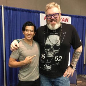 Gaku Space Instagram - Genji vs Hodor!
Sacanime, Sacramento with @kristiannairn aka Hodor in Game of Thrones!
This 6'10.5 tall actor was super nice!
I was surprised how big & tall he was when he stood up to take this photo (FYI, I'm 5'10).
How should Genji fight against Hodor, any suggestion? I'll say no shrikens to be fair. Lol
#overwatch #genji
#streetfighterassassinsfist #goki
#gameofthrones #hodor 
#sacanime #sacramento 
#crossover #fightingmatch 
#yes #myrare #smilingphoto #lol