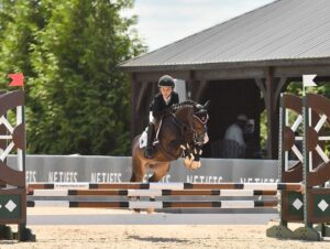 Georgina Bloomberg Instagram - Week 1 here in Traverse City was a great one, with Jasper and Rico Suave earning the championship in the Small Pony Hunters and winning the Classic, clear rounds from Viking and Nikita in the jumpers, my horses all earning top ten placings in the FEI and National classes, and Cassina closing out the week with a double clear performance in the 3* Grand Prix. 📷: @andrewrybackphotography @traversecityhorseshows