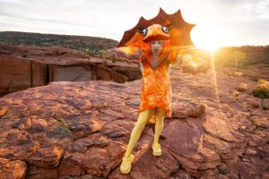 Ginny Lemon Instagram - “A cock, in a frock, on a rock, IN CROCS!”

In honour of the 30th anniversary of The Adventures of Priscilla, Queen of the Desert me and my sisters @officialsistersister @queenutica and @joeyjayisgay were given the fantastic opportunity to re-enact the final scene by claiming up Kings Canyon in full drag to commemorate 30th years of this iconic Australian drag masterpiece of cinema, a cult classic and any drag queens favourite. 

I could never in my wildest dreams believe that I would be lucky enough to be chosen for this, proper have to pinch myself. 

Also when they said “hey do you wanna do a photoshoot up Kings Canyon” I never thought about ACTUALLY walking up there, in FULL DRAG at 4am in the DARK! But we did it! To watch the sunrise in one of the most beautiful places on earth, was an absolute honour. 

Big love and shoutout to the amazing team who were with us the whole way and put up with my Diva fits @thekassieh @with.all.drew.respect  and @discoveryparksandresorts

Shot by @kanechenoweth on location at @watarrkanationalpark 🏜️

#ntaustralia @ntaustralia

Travel #sponsored by @australia 

#SeeAustralia