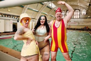 Ginny Lemon Instagram - Big Fatt Pool Party! @fattprojects 

I cannot explain to you how much I loved this event! Seeing so many diverse bodies in a pool was like a blissful fever dream. 

I don’t know about you but historically for me places like gyms, pools, anything remotely related to sport have also been associated with hate crime and insecurities. But THIS event was a game changer. I felt free, happy, fabulous & safe. 

Also leading an “aqua aerobics” session was a dream come true… watch this space… the mass YMCA is always a bonus 🤣

I truly hope we get to do more! Thanks @moseleyrdbaths for having us. 

@fattbutcher @mama.mamba @just_soriah what a dream team 😍

📸 @irinamackie
