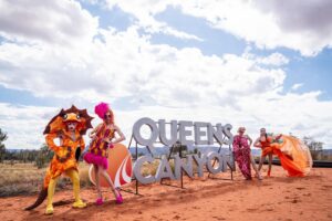 Ginny Lemon Instagram - “A cock, in a frock, on a rock, IN CROCS!”

In honour of the 30th anniversary of The Adventures of Priscilla, Queen of the Desert me and my sisters @officialsistersister @queenutica and @joeyjayisgay were given the fantastic opportunity to re-enact the final scene by claiming up Kings Canyon in full drag to commemorate 30th years of this iconic Australian drag masterpiece of cinema, a cult classic and any drag queens favourite. 

I could never in my wildest dreams believe that I would be lucky enough to be chosen for this, proper have to pinch myself. 

Also when they said “hey do you wanna do a photoshoot up Kings Canyon” I never thought about ACTUALLY walking up there, in FULL DRAG at 4am in the DARK! But we did it! To watch the sunrise in one of the most beautiful places on earth, was an absolute honour. 

Big love and shoutout to the amazing team who were with us the whole way and put up with my Diva fits @thekassieh @with.all.drew.respect  and @discoveryparksandresorts

Shot by @kanechenoweth on location at @watarrkanationalpark 🏜️

#ntaustralia @ntaustralia

Travel #sponsored by @australia 

#SeeAustralia