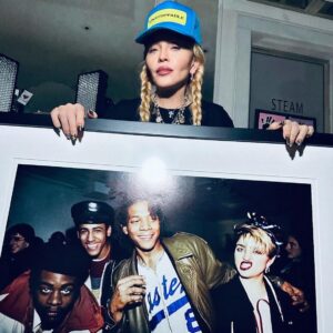 Guy Oseary Instagram - An early birthday 🎈gift for 👑 @madonna. 
I wish I could have been there with her in 1983. I showed up to New York 7 years later, summer of 1990 immediately following my high school graduation. 
That time period , 1983, NYC, this incredibly talented crew and the people around that scene inspired the world forever.
Art / Music/ Culture were exploding out of New York City. Artists supported artists. They showed up for eachother. There will never be another Basquiat, Warhol, Haring, Futura, Run-DMC, Grandmaster Flash, Melle Mel, Kurtis Blow etc etc. 
and oh yes… the one and ONLY 👑 Queen Madonna!!! 

Madonna: “I can’t imagine a better way to start my Birthday Month! Thank you -
@guyoseary for this beautiful souvenir of myself with Basquiat
Futura 2000 and Easy Gee at the Fun gallery in 1983.
There will never be another time like this .
N.Y.C 🗽 was at the epicenter of everything exciting!!
The Fun gallery was where it all happened! Keith Haring’s paintings adorned the walls.
And Young artist and musicians were always welcome.
This was a time when art, music and culture were side by side, hand in hand. When artists supported one another............... ❤️
So grateful to have experienced this moment in Time”.. 

This photo from 1983 was taken by 📸 @marthacoopergram
