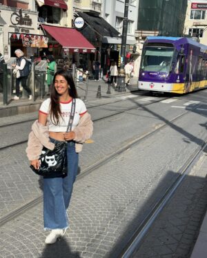 Harleen Sethi Instagram - Not to be tram-atic, but Trams have always fascinated me.. From old pictures & videos of Bombay to the ones we see in films that are shot in Calcutta, trams remind me of the more simpler times..

More than the landmark attractions in Europe, I love travelling in trams to soak in the new place whilst being on the journey.. Seeing a passing view of different streets, locals, street foods, clothes & crockery shops, harbours, mosques, cafes, stations, people waiting, people rushing wanting to get somewhere etc.. 

Everytime I would see a tram approaching from nowhere, I would jump right in on the tracks to get a shot and then see it pass by me into the horizon of the crowds, leaving the trail of the city a little bit sorted.. Istanbul trams were straight outta my dreams 💟