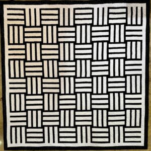 Harvey Fierstein Instagram - This was conceived as a background for appliqué and couching experiments but I fell in love with the simplicity of it so... Quilted it as is and bound it and... say hello to "Harvey's Basket"