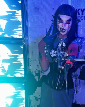 HoSo Terra Toma Instagram - 💙🦟🫀

Thank u @melovemealot for these sick @skoot_apparel pieces 🔪🔥💙
Headpiece by me hair by @laken.ria