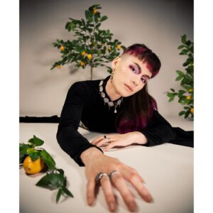 Ian Alexander Instagram - 💛 CHANH / LEMON 🍋
my photoshoot with @hanz.a is very near and dear to my heart ✨❤️‍🔥 i’m grateful to share my Vietnamese heritage with u. 
lemons have a special meaning to nonbinary Viets. a new gender neutral pronoun, directly translating to “lemon,” was created from chị   anh = chanh (feminine pronoun/sister   masculine pronoun/brother = lemon). 🍋 
our culture is constantly growing and evolving: i will never forget my roots, and the fruits that my tree bears will be dazzling to taste.
~
📸 photography: the incredible @hanz.a 
💡lighting: always slaying @maevellisullivan 
💋 makeup, hair, styling: me!
👗 áo dài: AoDaiThuyAnh
💎 necklace : @fruitflyforever 
👚 corset: custom @retrofolie corset using a Đông Hồ painting titled “Rat Wedding”
👢 shoes: @azaleawangofficial