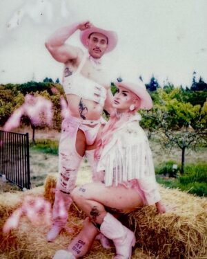 Ilona Verley Instagram - “Working 9-5, what a way to make a living”
💖💖💖💖
Had the most fabulous time working with @thegayagendaevents this past weekend for their 2nd annual Garden Party Tea Dance at the @ubcfarm 
💖💖💖💖
I’m a sucker for a good theme and the inspiration struck when @shashaxl_ and I found a beautiful white leather coat at @stoxxvintage that I knew was going to become a fab look, however it was too big on me so as I took it in and realized how much excess leather there was going to be I asked @hulk_broghen if he would be down to do a matching look with me and the two of us then worked together to use the remnants and materials I had around the studio to bring our matching cowboy/cowgirl looks to life and combine our worlds to create something completely unique and out of the box that would bring a visual aspect of our vibes to the FUNCTION!
💖💖💖💖
Thank you to @thegayagendaevents for having us be apart, it was a BLAST!
Shout out to @nudebeverages for having the perfect drinks on hand to match the PINK energy we were giving!
@lonsdaleleather for the hardware and the leather paint that made the pink-ification of the iconic white leather coat that provided these looks possible!
And our fierce friends and photographers for capturing these moments! 
3rd photo by: @aleemkassam 
4th photo by: @japantara 
5th photo by: milesmead0ws 
6th photo by: @mx.jiggityjeff 
7th photo by: @kylson92 
💖💖💖💖
#labourday #laborday #wildwest #cowboy #cowgirl #fashion #costumeparty #drag #dragqueen #pinkhue #pinkhair #pinkcowboyhat #leatherwork #leathercoat #leatherfashion #upcycle