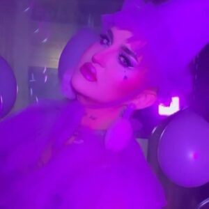Ilona Verley Instagram - “Maybe if I knew all of them well,
I wouldn't have been trapped inside this hell that holds me”
💜💜💜💜
I survived the 27 club!
As silly as it may seem it’s always been something that has haunted me, 7’s and death have been prominent in my life and the whole concept of the 27 club had me feeling ANXIOUS this past year if we r being REAL!
💜💜💜💜
I’m now going into the last couple years of my 20’s feeling secure in the version of myself I am now and feeling a lot of clarity around my relationships and what I am able to bring to the table in terms of self identity and accountability.
I’m truly feeling free and truly feeling happy.
I’m so close to the person i used to fantasize about being, my dreams are slowly becoming my reality and that is the best birthday present I could ever ask for!
💜💜💜💜
Photos: @allthatbeth_
Ruffled coat : @evanclayton 
Matching accessories: by me 
Earrings: @vexdesigns.ca
Nails: @kissproducts
💜💜💜💜
Face:
@kryolanofficial paint sticks NB2 & TV White
@rcmamakeup colourless powder
@kvdbeauty Contour palettes 
@limecrimemakeup hi-lite mermaids palette
Eyes:
@colourpopcosmetics Fade Into Hue palette
@litcosmetics Party Girl Glitter
@limecrimemakeup Liquid Liner in Baby’s Breath & Black
Lips:
@kvdbeauty Lolita 
 
@limecrimemakeup Hi-lite Mermaids over top
Brows:
@kvdbeauty Medium Brown pomade 
💜💜💜💜
#dragqueen #drag #purplemakeup #glittereyes #glittermakeup #graphicliner #limecrime #kvdbeauty #canadasdragrace #lavenderhaze