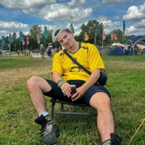 Jacob Dudman Instagram - This month, I feel lucky to be alive. I hope you all find company that draws you closer to your true self, and find loved ones you can freely express yourself around.💛

Also, thank you to @womadfestival for having us this weekend. I’ve been a fan of the festival since I first went (age 4!!) and it’s a wonderful event celebrating diversity, inclusivity and community. I wish the whole world was a bit more ‘WOMAD’. x